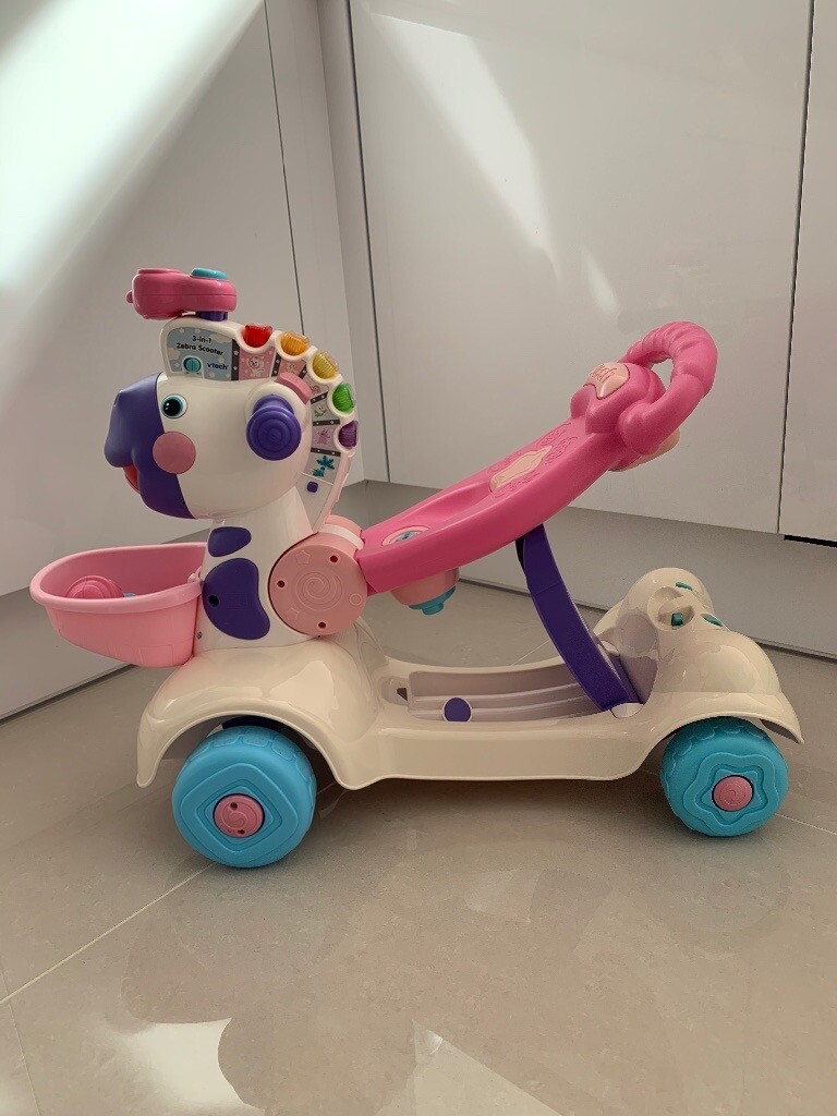 vtech zebra scooter pink